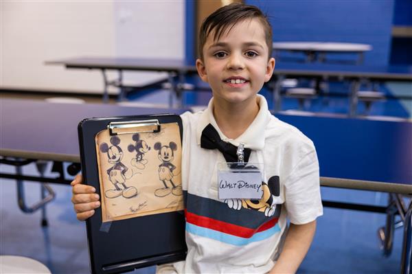 Students in 3rd grade participating in the Wax Museum.